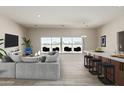 Open living area with comfortable seating and views of the backyard at 1973 W Brooke Ln, Queen Creek, AZ 85144