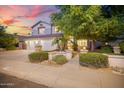 Two-story home with landscaped yard and driveway at 2055 S Marble St, Gilbert, AZ 85295