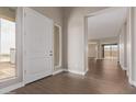 Bright entryway with a view to the living areas beyond at 20755 W San Miguel Ave, Buckeye, AZ 85396