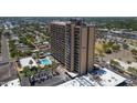 High rise building with pool and parking at 4750 N Central Ave # 8B, Phoenix, AZ 85012