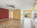 Bright living room featuring laminate flooring and an open concept layout at 16336 E Palisades Blvd # 9, Fountain Hills, AZ 85268