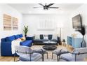 Bright and airy living room with a comfortable sofa and stylish decor at 3233 S Lebanon Ln, Tempe, AZ 85282