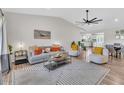 Bright and airy living room featuring hardwood floors, comfortable seating, and stylish decor at 3406 E Libby St, Phoenix, AZ 85032