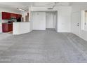 Spacious living room with carpet and kitchen access at 17017 N 12Th St # 2124, Phoenix, AZ 85022