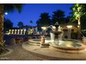 Beautiful fountain at night in community courtyard at 10015 E Mountain View Rd # 2011, Scottsdale, AZ 85258
