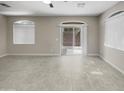 Bright living room featuring tile floors and sliding glass doors at 2150 W Alameda Rd # 1250, Phoenix, AZ 85085