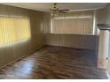 Living room with wood flooring and ceiling fan at 5933 E Main St # 143, Mesa, AZ 85206