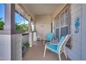 Inviting porch with seating and coastal decor at 201 S Greenfield Rd # 204, Mesa, AZ 85206