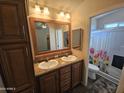 Bathroom with double sinks and a shower/tub combo at 650 N Hawes Rd # 3803, Mesa, AZ 85207