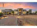 Stunning curb appeal! This expansive home features a brick driveway and gated entry at 7800 E Dale Ln, Scottsdale, AZ 85266