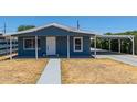 Charming blue house with carport and walkway at 113 S 92Nd Ave, Tolleson, AZ 85353