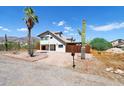 Contemporary home with mountain views and desert landscaping at 5599 S Alameda Rd, Gold Canyon, AZ 85118