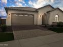 One story home with a two car garage at 15963 W Montana De Oro Dr, Surprise, AZ 85387
