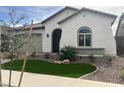 One-story home with a two-car garage at 15963 W Montana De Oro Dr, Surprise, AZ 85387