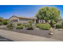One story home with landscaped yard at 17780 W Canto Bonito Ln, Surprise, AZ 85387