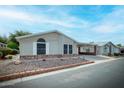 Single-story home with landscaped yard at 2550 S Ellsworth Rd # 660, Mesa, AZ 85209