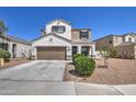 Two-story house with a brown garage door and nicely landscaped front yard at 3882 W Alabama Ln, San Tan Valley, AZ 85144
