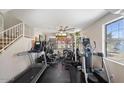 Spacious home gym with various exercise equipment at 3406 E Wildwood Dr, Phoenix, AZ 85048