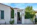 Private gated entryway with brick pavers and landscaping at 900 E Peach Tree Pl, Chandler, AZ 85249