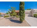 Single story home with two-car garage and desert landscaping at 14602 N Olympic Way, Fountain Hills, AZ 85268