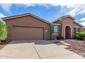 One-story home with a two-car garage at 42425 W North Star Dr, Maricopa, AZ 85138