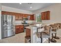 Kitchen features granite countertops and stainless steel appliances at 40261 N La Cantera Dr, Anthem, AZ 85086