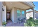 Covered entry with two chairs and a small table at 15820 S 177Th Dr, Goodyear, AZ 85338