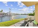 Relaxing patio overlooking a canal with comfortable seating at 1438 W Coral Reef Dr, Gilbert, AZ 85233