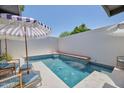 Enjoy this refreshing pool with tiled accents and seating at 6649 N Majorca E Ln, Phoenix, AZ 85016