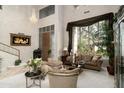 Spacious living room featuring a comfortable seating area and large windows at 6545 N 29Th St, Phoenix, AZ 85016