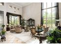 Elegant living room with high ceilings, large windows, and ample seating at 6545 N 29Th St, Phoenix, AZ 85016