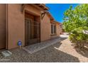 House exterior showcasing a side entrance and landscaping at 5713 W Rowel Rd, Phoenix, AZ 85083