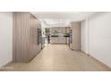 Modern kitchen with ample cabinetry and tile floors at 7012 N 22Nd St, Phoenix, AZ 85020