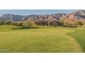 Golf course view with mountain backdrop at 9633 E Quarter Circle Loop, Gold Canyon, AZ 85118