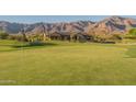 Golf course view with mountain backdrop at 9633 E Quarter Circle Loop, Gold Canyon, AZ 85118