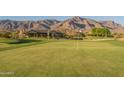 Golf course view with mountain backdrop at 9633 E Quarter Circle Loop, Gold Canyon, AZ 85118