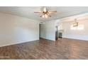 Open living room and dining area with hardwood floors at 4943 E Indian School Rd # 4, Phoenix, AZ 85018