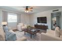 Living room with hardwood floors, comfy seating, and TV at 4943 E Indian School Rd # 4, Phoenix, AZ 85018