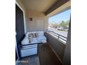 Spacious balcony with seating and views of the surrounding area at 7009 E Acoma Dr # 2037, Scottsdale, AZ 85254