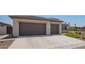 Two-car garage and nicely landscaped front yard at 2813 N 168Th Ave, Goodyear, AZ 85395