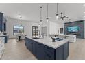 Spacious kitchen with a large island, modern appliances, and breakfast bar at 39220 N 30Th Dr, Phoenix, AZ 85086
