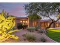 Stunning home exterior with desert landscaping at 8919 E Calle Del Palo Verde --, Scottsdale, AZ 85255