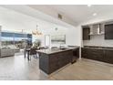 Modern kitchen with stainless steel appliances and island at 7180 E Kierland Blvd # 509, Scottsdale, AZ 85254