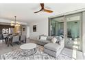 Spacious living room with comfortable seating and access to balcony at 7180 E Kierland Blvd # 509, Scottsdale, AZ 85254