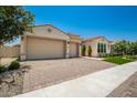 Two-story home with a two car garage and well-maintained landscaping at 9649 E Solina Ave, Mesa, AZ 85212