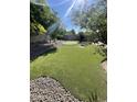 Landscaped backyard with putting green at 7264 W Cielo Grande --, Peoria, AZ 85383