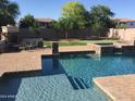 Inviting pool with spa and fire pit at 7264 W Cielo Grande --, Peoria, AZ 85383