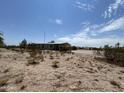 Aerial view of a desert property with a mobile home at 2249 W Daniel Rd, San Tan Valley, AZ 85144