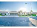 Two-story home with two car garage and landscaped yard at 772 N Swan Dr, Gilbert, AZ 85234