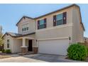 Two-story house with attached garage at 16245 W Culver St, Goodyear, AZ 85338
